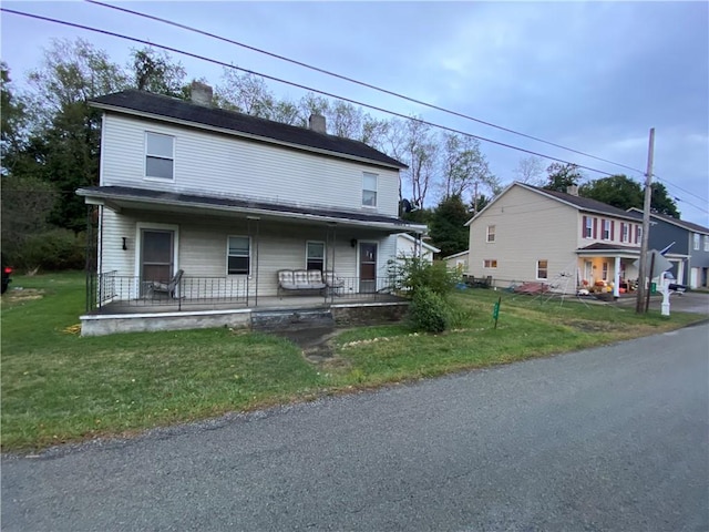 272 Starlite Rd, North Union Twp, PA 15456 - view of property with a porch, a chimney, and a front yard