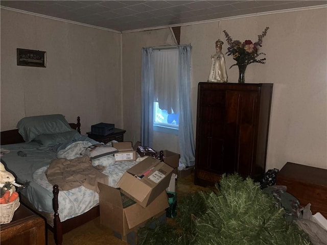 bedroom featuring crown molding