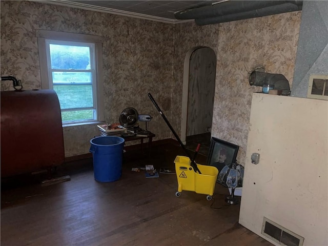 272 Starlite Rd, North Union Twp, PA 15456 - miscellaneous room featuring wood finished floors, oil tank, and wallpapered walls