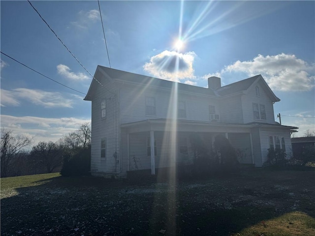 view of side of property featuring a garage