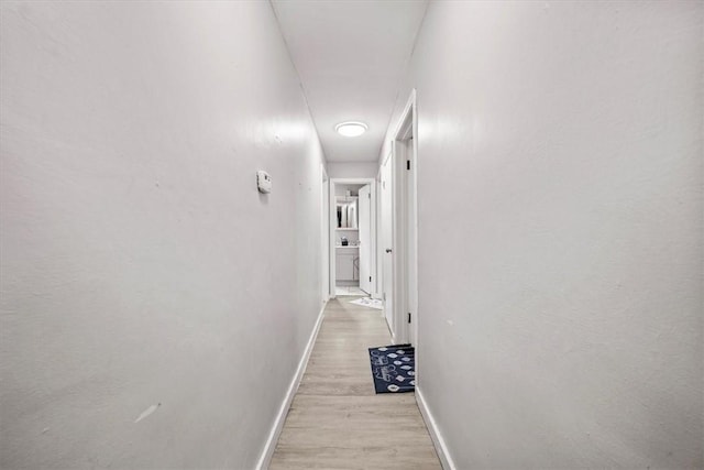 hallway featuring light wood-type flooring