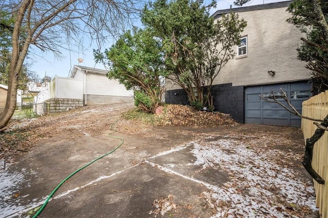 exterior space featuring a garage