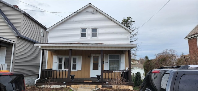 view of front of property featuring covered porch