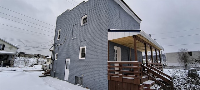 view of snow covered property