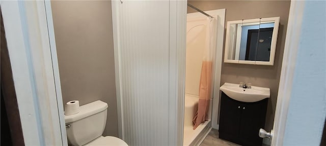 full bathroom with toilet, shower / bath combination with curtain, and vanity