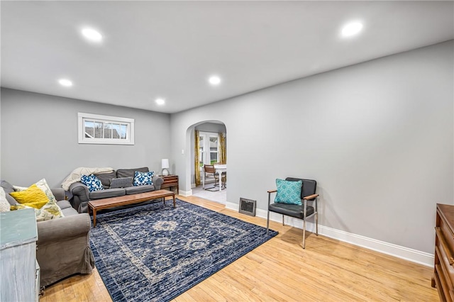 living room with hardwood / wood-style floors