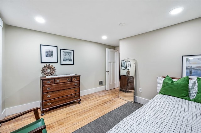 bedroom featuring light hardwood / wood-style floors