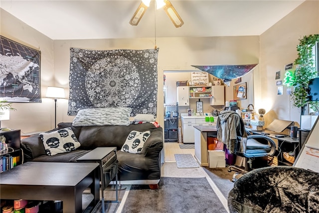 interior space with ceiling fan