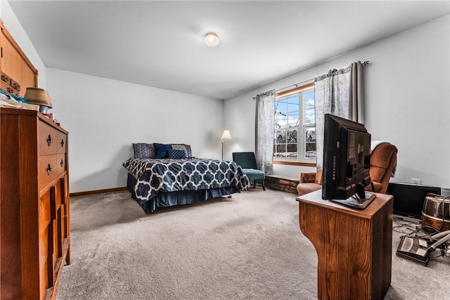 bedroom featuring light carpet