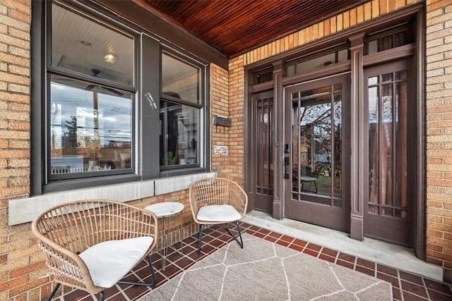 entrance to property featuring covered porch