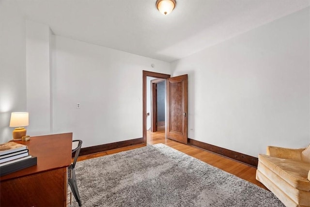 home office featuring hardwood / wood-style flooring