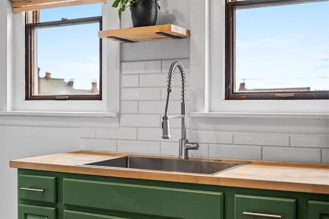 interior space featuring decorative backsplash and sink