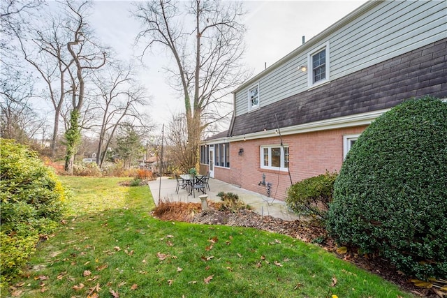 view of yard with a patio area