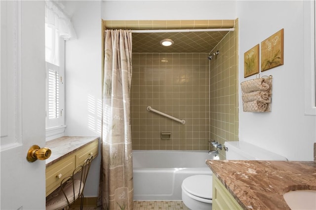 full bathroom featuring toilet, vanity, and shower / bathtub combination with curtain