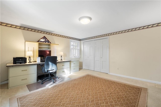 office area featuring light colored carpet