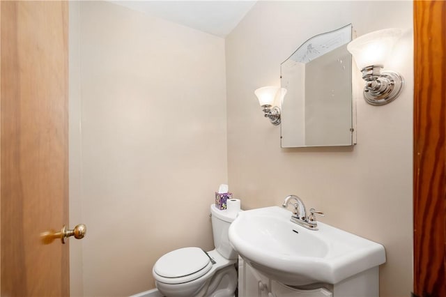 bathroom featuring sink and toilet