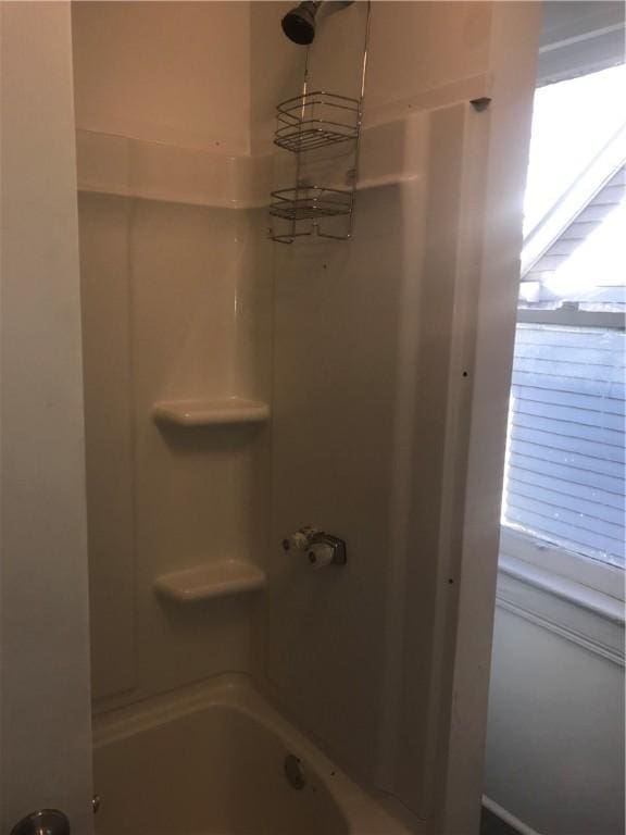 bathroom with shower / bathing tub combination