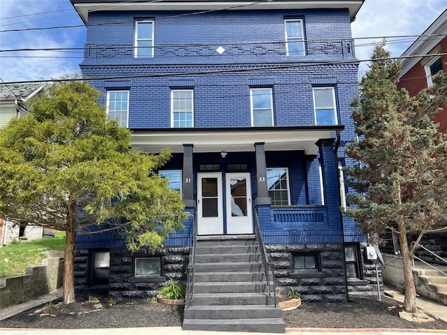 view of front of property featuring covered porch