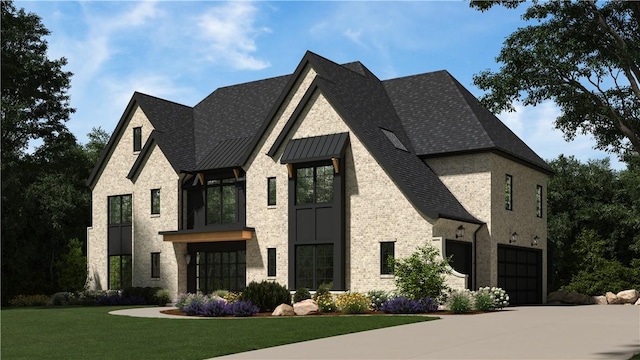 view of front facade with a front lawn and a garage