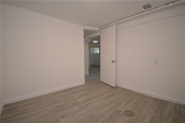 unfurnished room featuring light hardwood / wood-style flooring