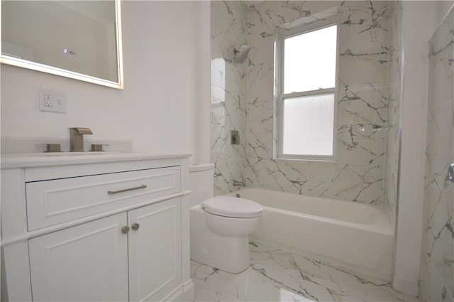 full bathroom featuring vanity, toilet, and tiled shower / bath