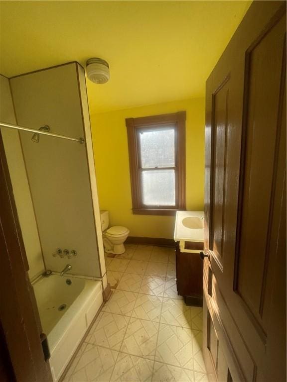 full bathroom with vanity,  shower combination, and toilet