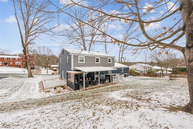 view of snow covered property