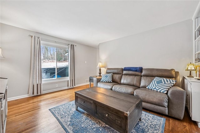 living room featuring light wood-type flooring