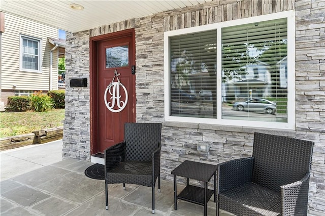 entrance to property with covered porch