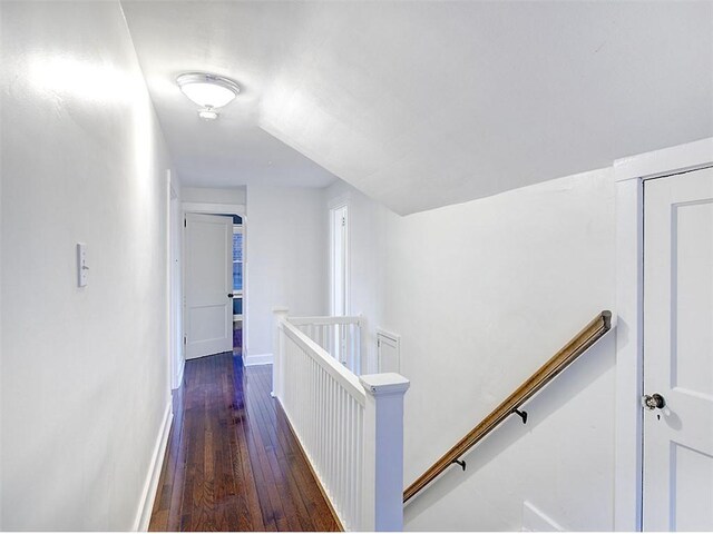 hallway featuring dark wood-type flooring