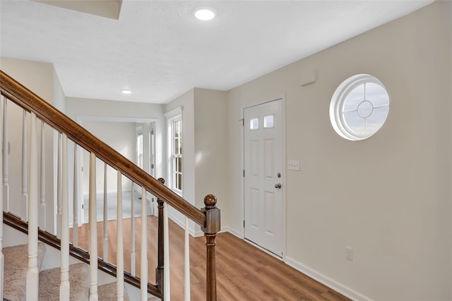 foyer with hardwood / wood-style flooring