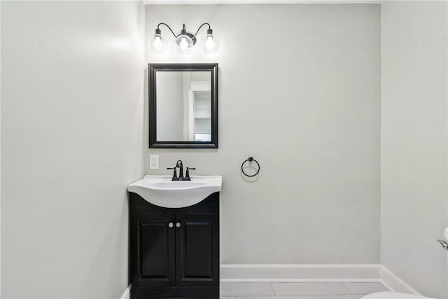 bathroom with tile patterned floors and vanity