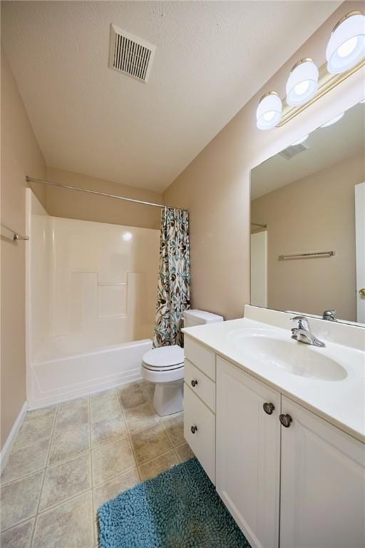 full bathroom featuring tile patterned flooring, vanity, toilet, and shower / tub combo