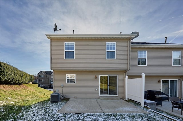 back of house with a patio and central AC unit