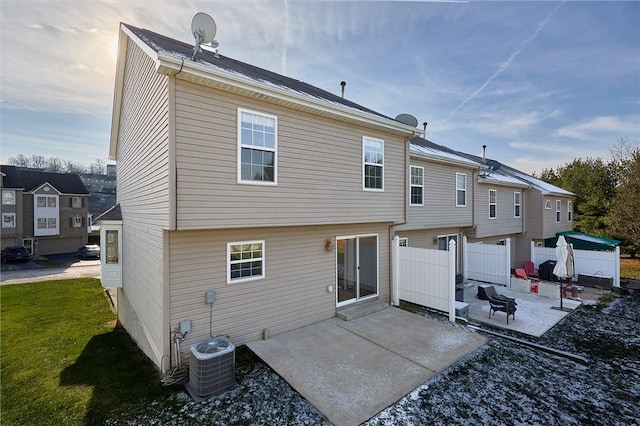 back of property featuring a patio area and central air condition unit