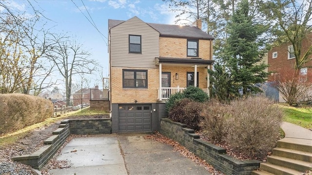 view of front of property with a garage