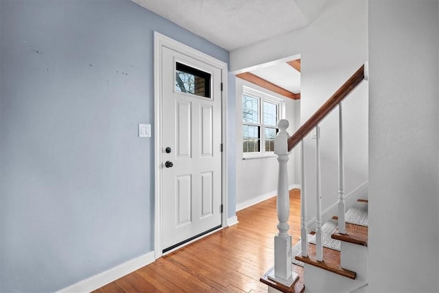 foyer with light wood-type flooring