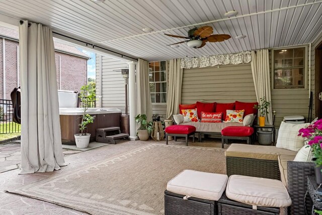 exterior space featuring ceiling fan