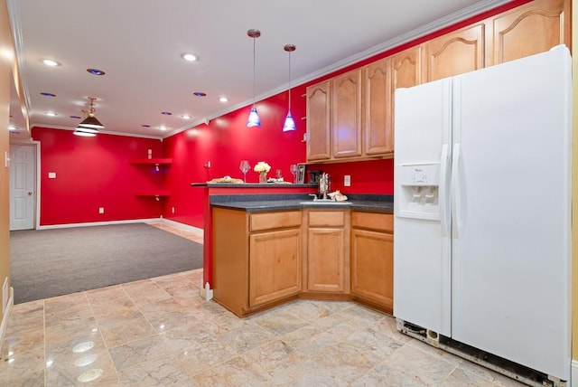 kitchen featuring crown molding, light colored carpet, white fridge with ice dispenser, and hanging light fixtures