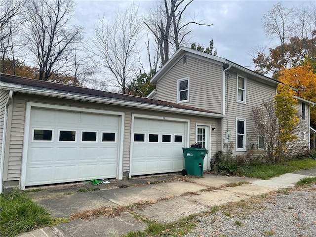 view of property exterior featuring a garage