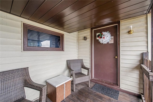 property entrance with covered porch