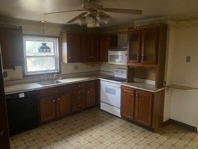 kitchen with ceiling fan, sink, crown molding, pendant lighting, and white appliances