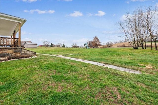 view of yard with a rural view