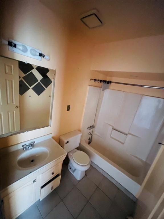 full bathroom featuring tile patterned flooring, vanity, toilet, and shower / washtub combination