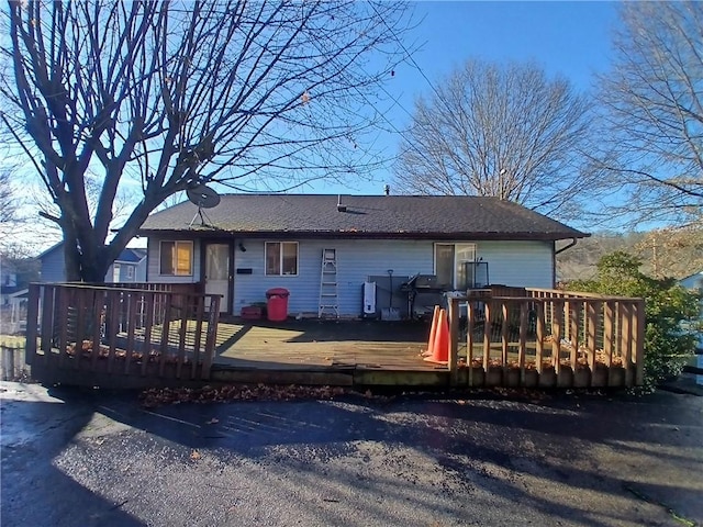 view of front of property featuring a wooden deck