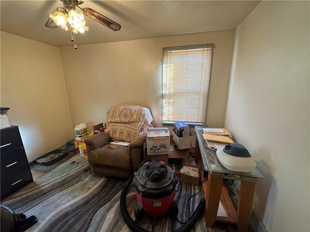 sitting room with ceiling fan