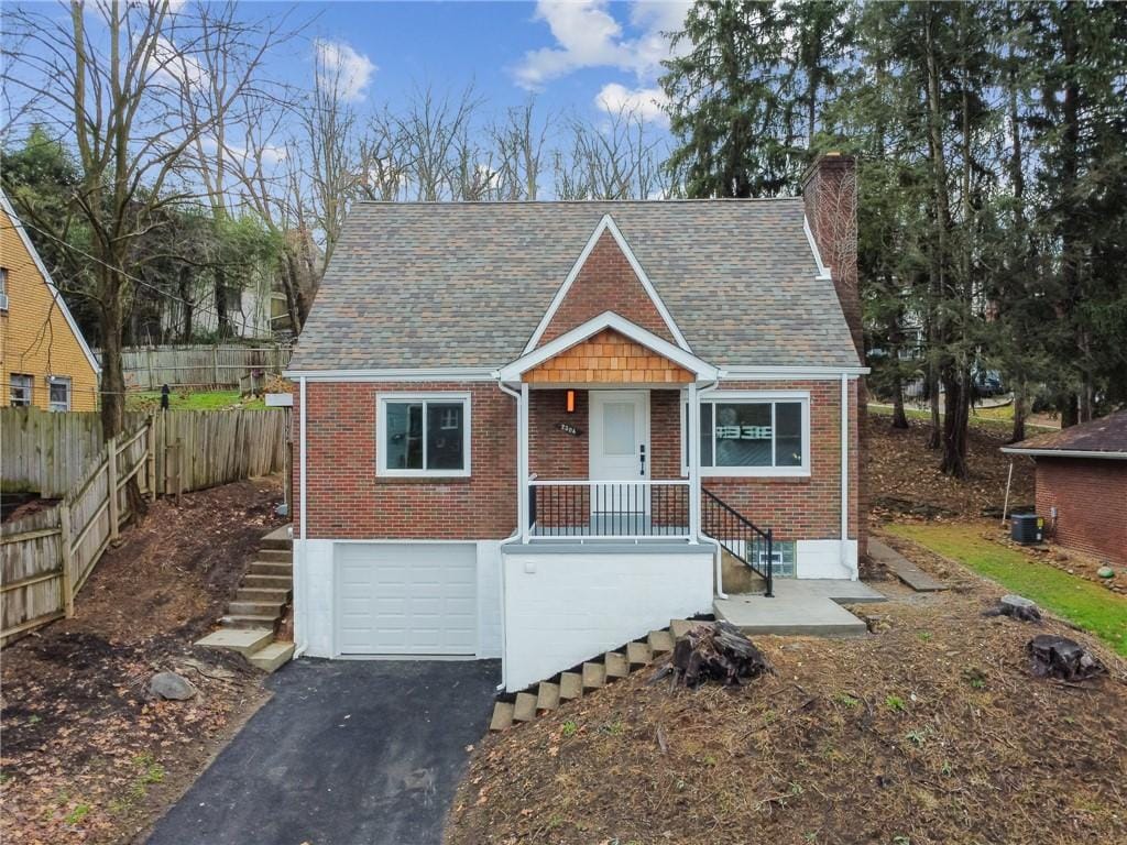 bungalow-style house with a garage