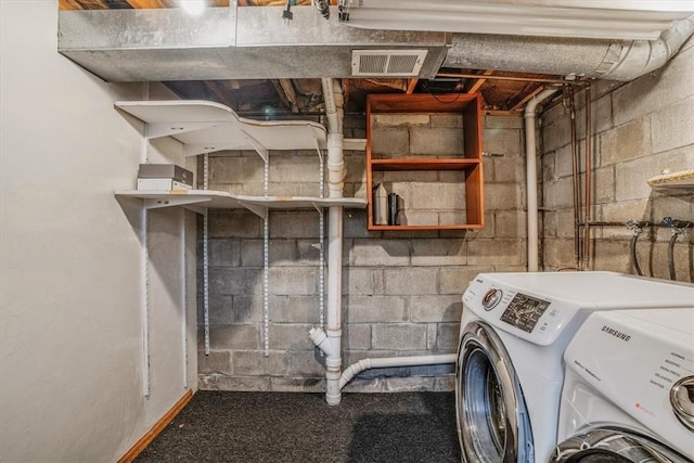 washroom with washer and clothes dryer