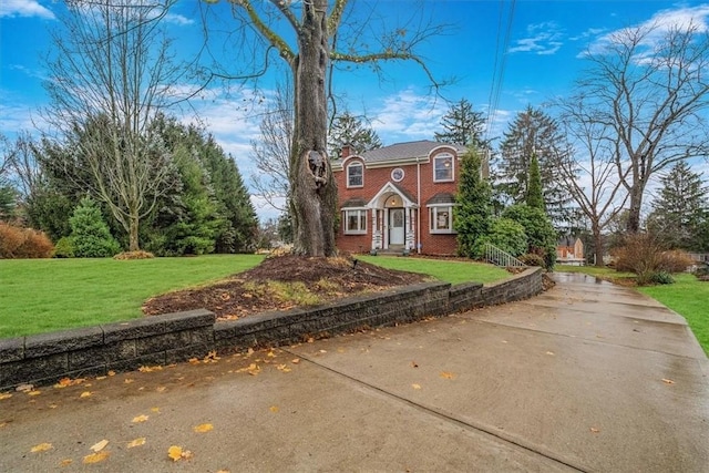 view of front of home with a front yard