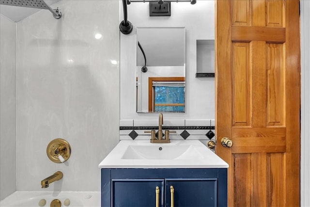 bathroom with vanity and tub / shower combination